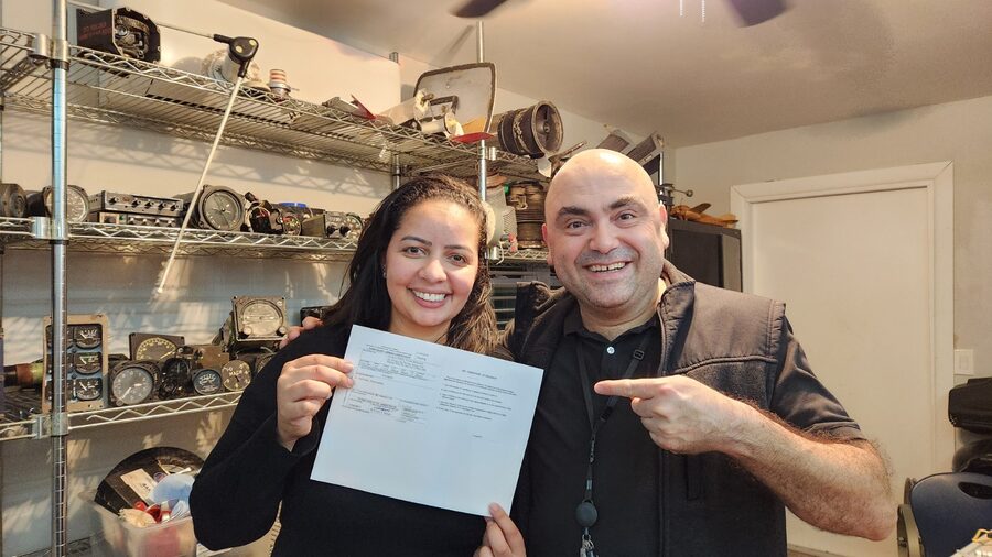 A&P graduate celebrating her certificate with instructor Kivilcim Ozaner